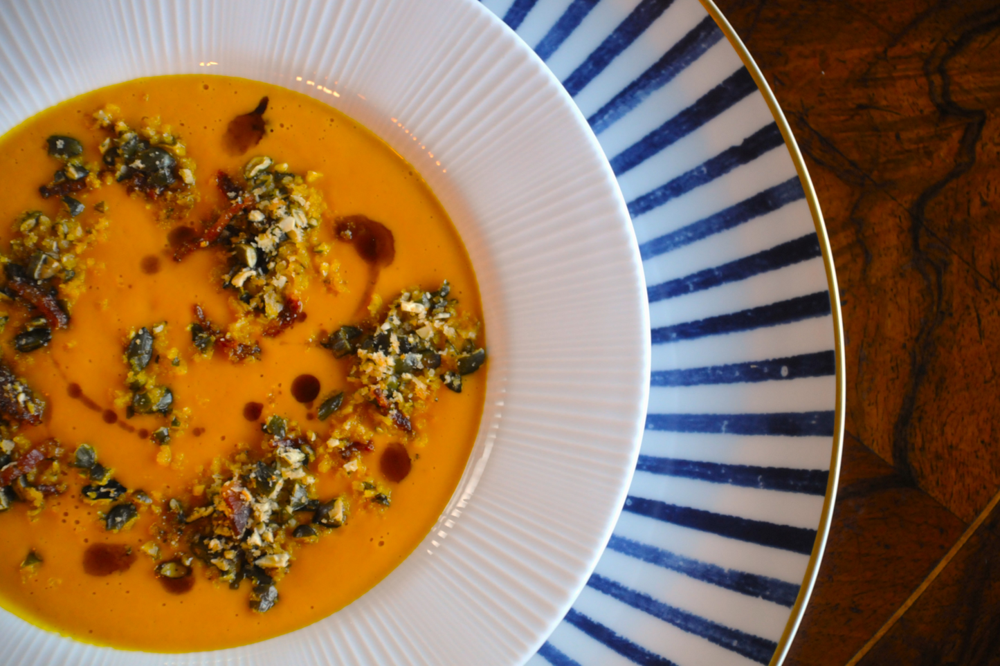 Pumpkin Soup with a Guanciale, White Truffle Oil & Pumpkin Seed Crumble
